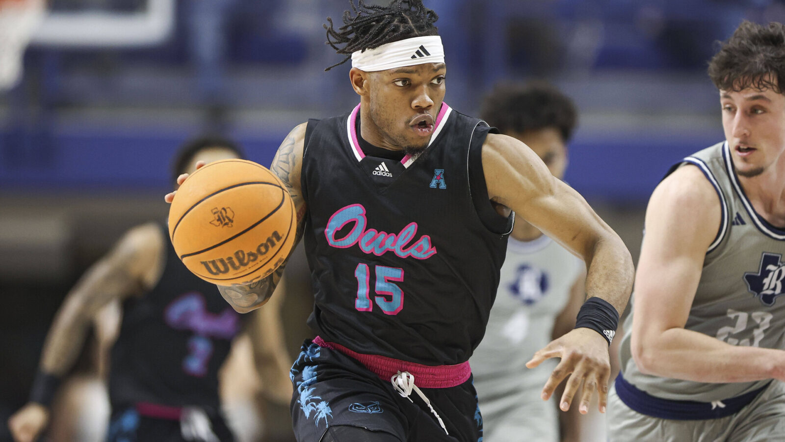 Florida Atlantic Owls guard Alijah Martin (15) drives with the ball on a fast break during the second half against the Rice Owls at Tudor Fieldhouse.