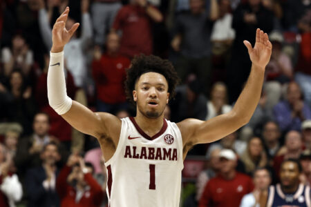 Alabama Crimson Tide guard Mark Sears (1) celebrates after a score against the Auburn Tigers during the second half at Coleman Coliseum.