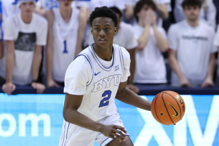 Jan 27, 2024; Provo, Utah, USA; Brigham Young Cougars guard Jaxson Robinson (2) brings the ball up the court against the Texas Longhorns during the second half at Marriott Center.