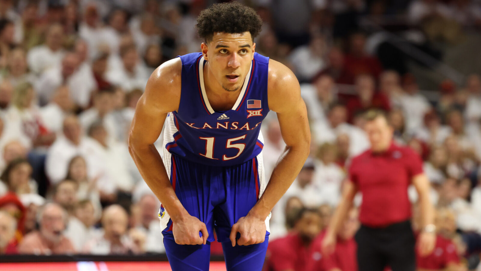 Feb 4, 2023; Ames, Iowa, USA; Kansas Jayhawks guard Kevin McCullar Jr. (15) reacts during a game against the Iowa State Cyclones at James H. Hilton Coliseum.