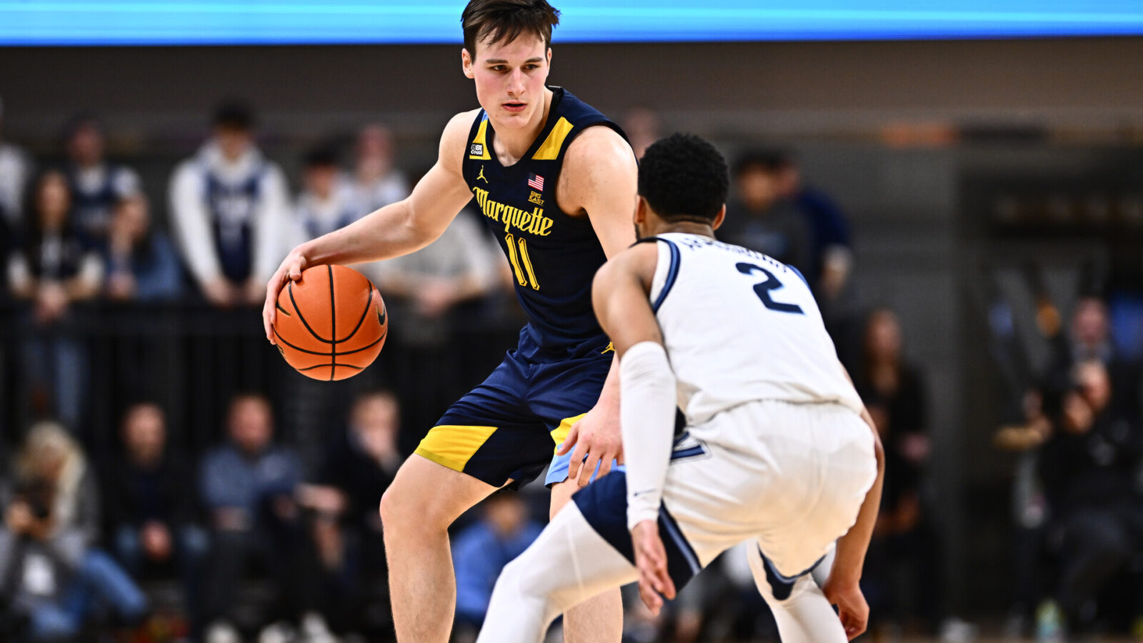 Jan 30, 2024; Villanova, Pennsylvania, USA; Marquette Golden Eagles guard Tyler Kolek (11) controls the ball against Villanova Wildcats guard Mark Armstrong (2) in the second half at William B. Finneran Pavilion.