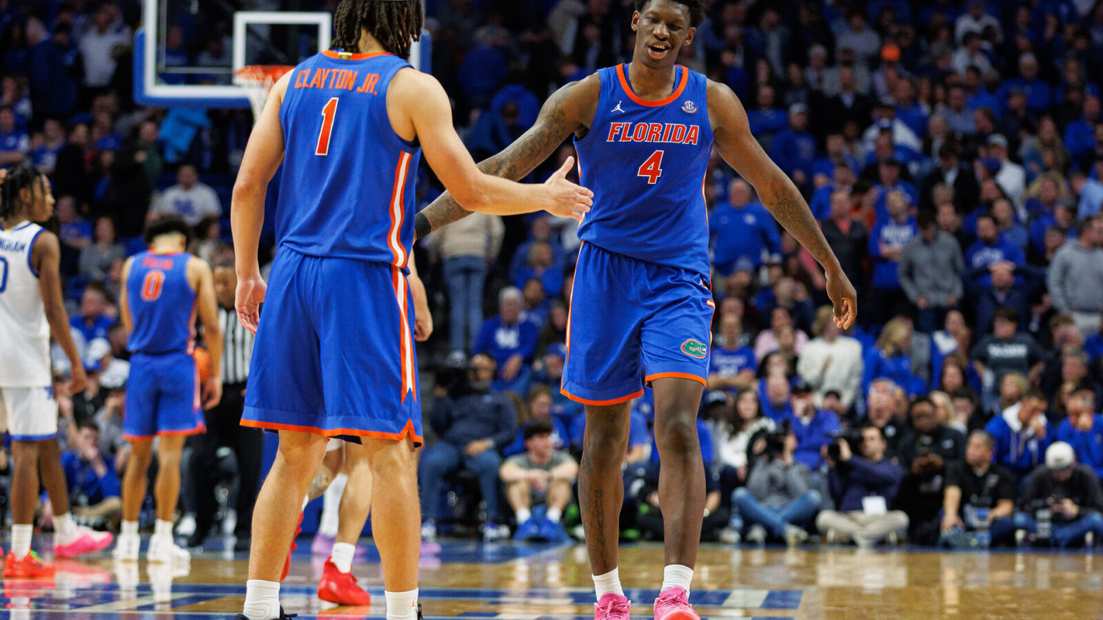 Jan 31, 2024; Lexington, Kentucky, USA; Florida Gators forward Tyrese Samuel (4) celebrates with guard Walter Clayton Jr. (1) during overtime against the Kentucky Wildcats at Rupp Arena at Central Bank Center.