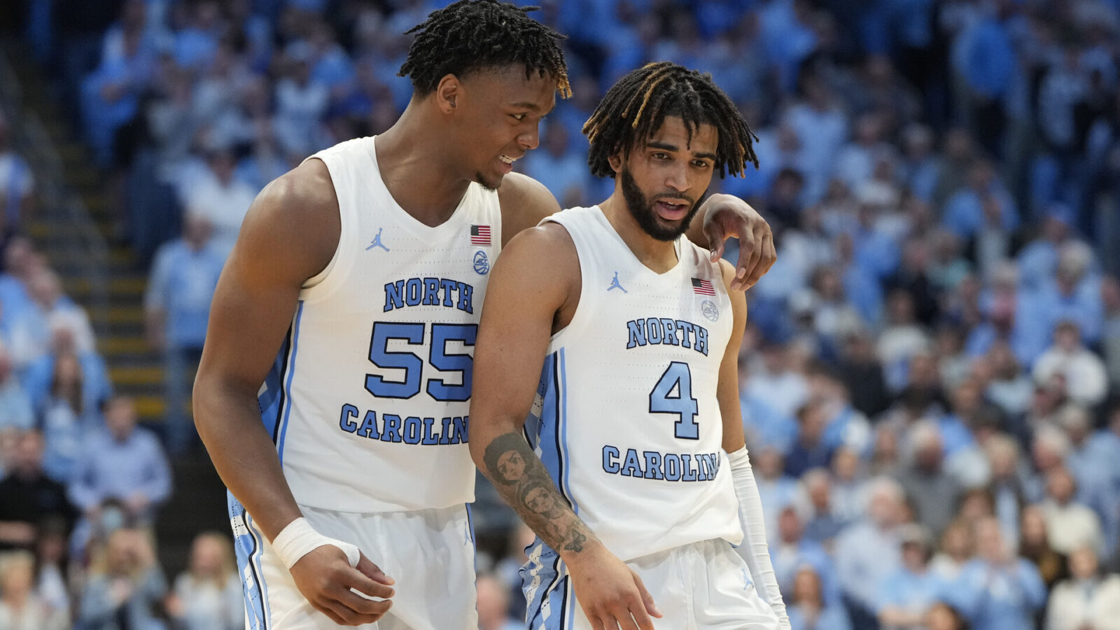 Feb 3, 2024; Chapel Hill, North Carolina, USA; North Carolina Tar Heels forward Harrison Ingram (55) and guard RJ Davis (4) in the second half at Dean E. Smith Center.