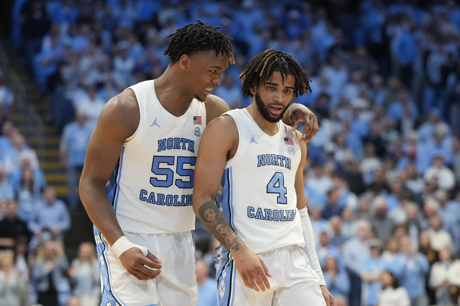 Feb 3, 2024; Chapel Hill, North Carolina, USA; North Carolina Tar Heels forward Harrison Ingram (55) and guard RJ Davis (4) in the second half at Dean E. Smith Center.