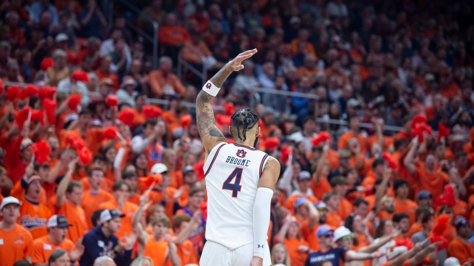 Auburn Tigers forward Johni Broome (4) pumps up the crowd as Auburn Tigers take on Alabama Crimson Tide at Neville Arena in Auburn, Ala., on Wednesday, Feb. 7, 2024. Auburn Tigers defeated Alabama Crimson Tide 99-81.