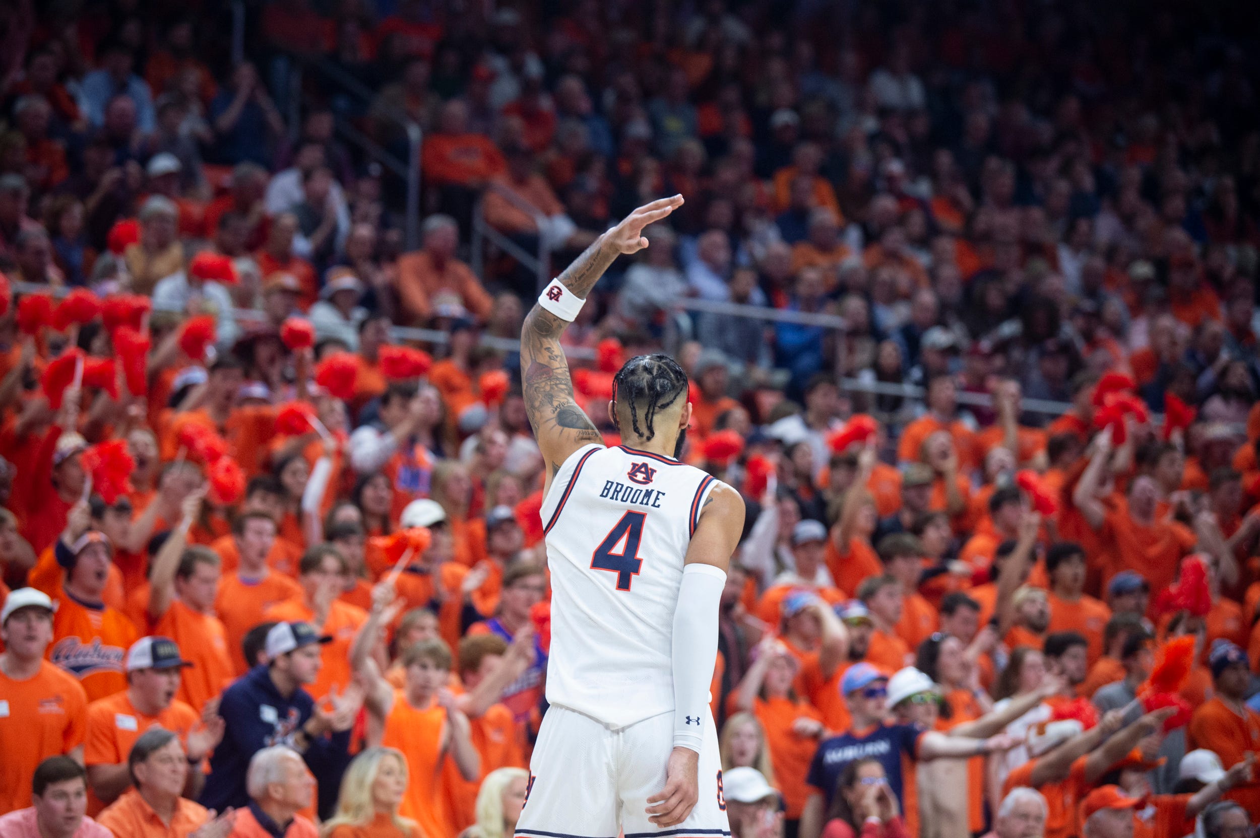 Auburn Tigers forward Johni Broome (4) pumps up the crowd as Auburn Tigers take on Alabama Crimson Tide at Neville Arena in Auburn, Ala., on Wednesday, Feb. 7, 2024. Auburn Tigers defeated Alabama Crimson Tide 99-81.