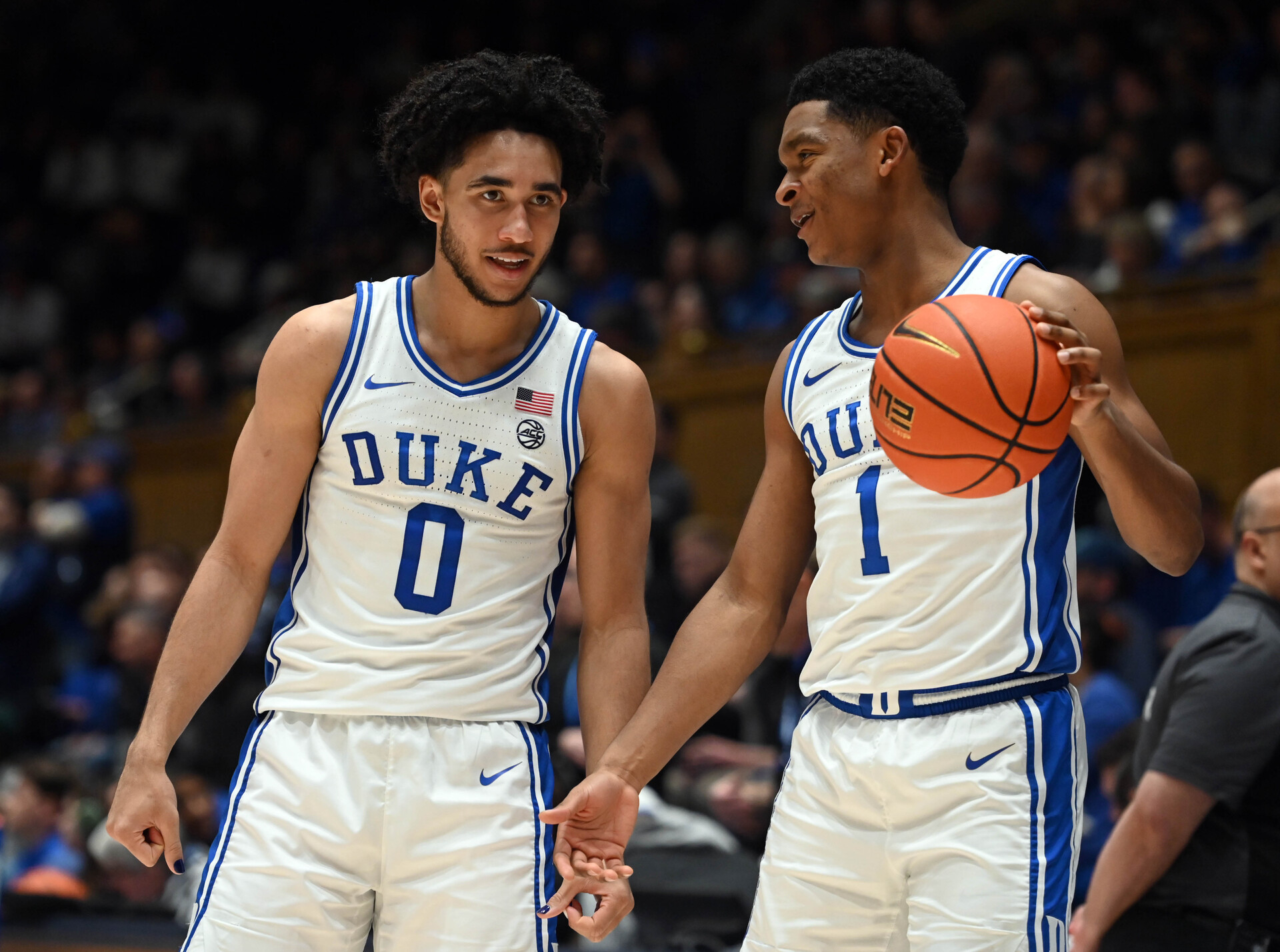 Feb 7, 2024; Durham, North Carolina, USA; Duke Blue Devils guard Jared McCain (0) and guard Caleb Foster (1) chat during warm ups prior to the second half against the Notre Dame Fighting Irish at Cameron Indoor Stadium. The Blue Devils won 71-53.