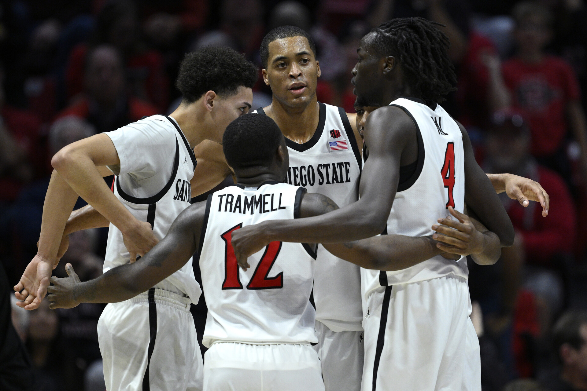 Feb 13, 2024; San Diego, California, USA; San Diego State Aztecs forward Jaedon LeDee (13) huddles with teammates during the second half against the Colorado State Rams at Viejas Arena.