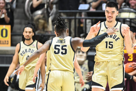 Purdue Boilermakers guard Lance Jones (55) and Purdue Boilermakers center Zach Edey (15) celebrate after a made shot during the first half at Mackey Arena.