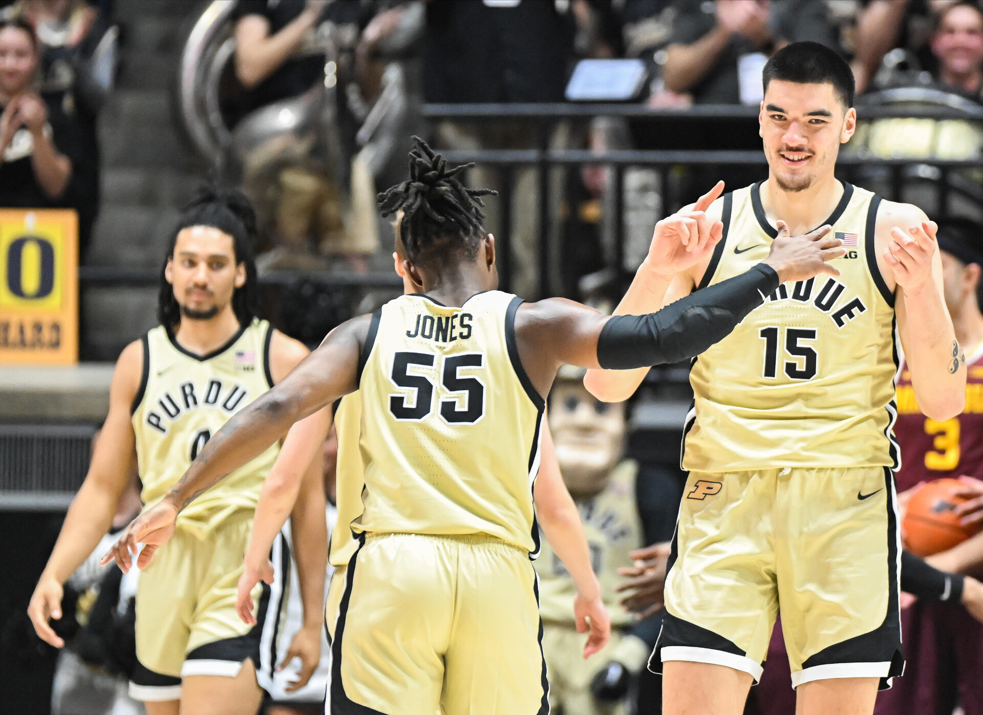 Purdue Boilermakers guard Lance Jones (55) and Purdue Boilermakers center Zach Edey (15) celebrate after a made shot during the first half at Mackey Arena.