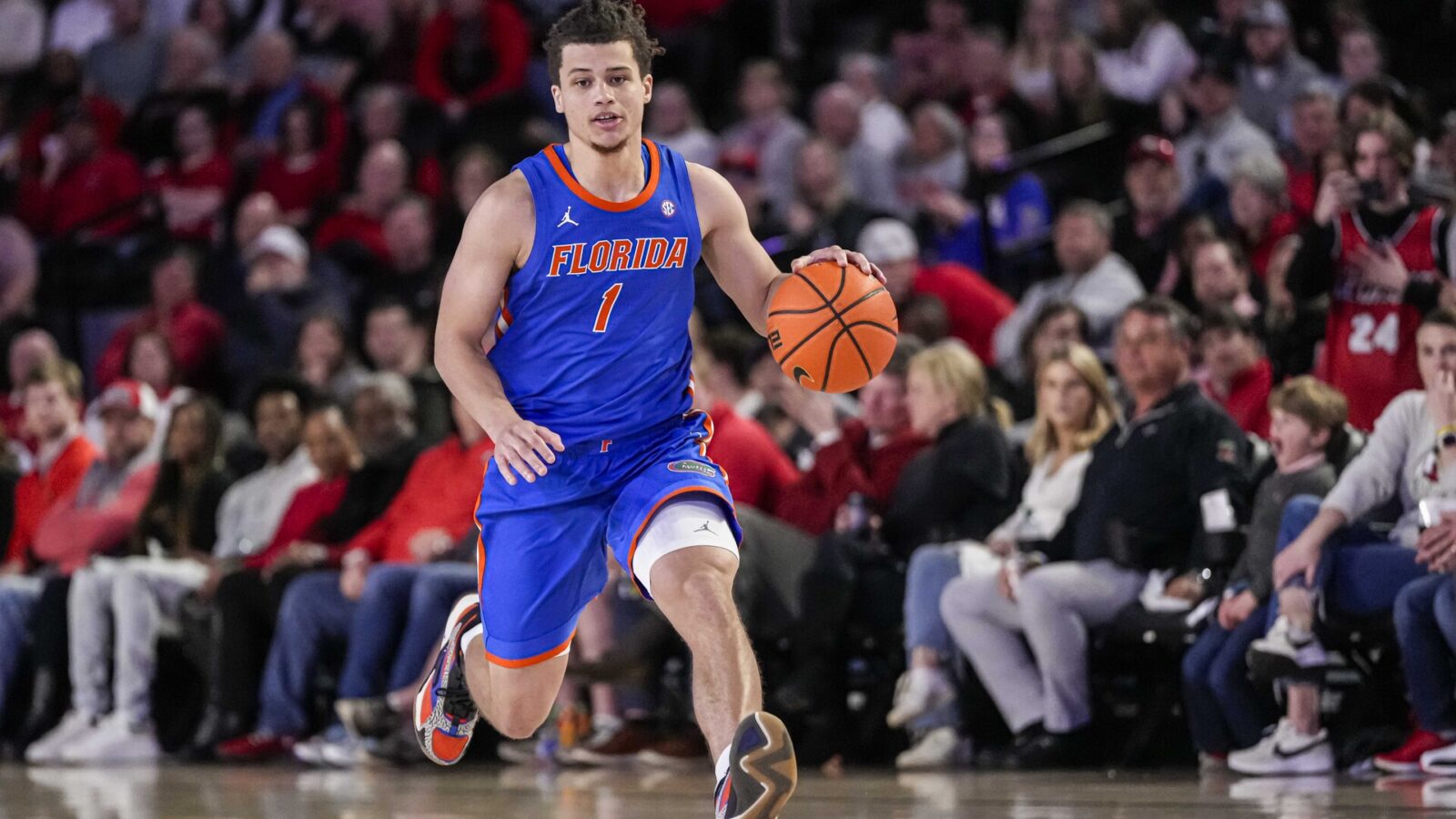 Feb 17, 2024; Athens, Georgia, USA; Florida Gators guard Walter Clayton Jr. (1) brings the ball up the court against the Georgia Bulldogs during the second half at Stegeman Coliseum.