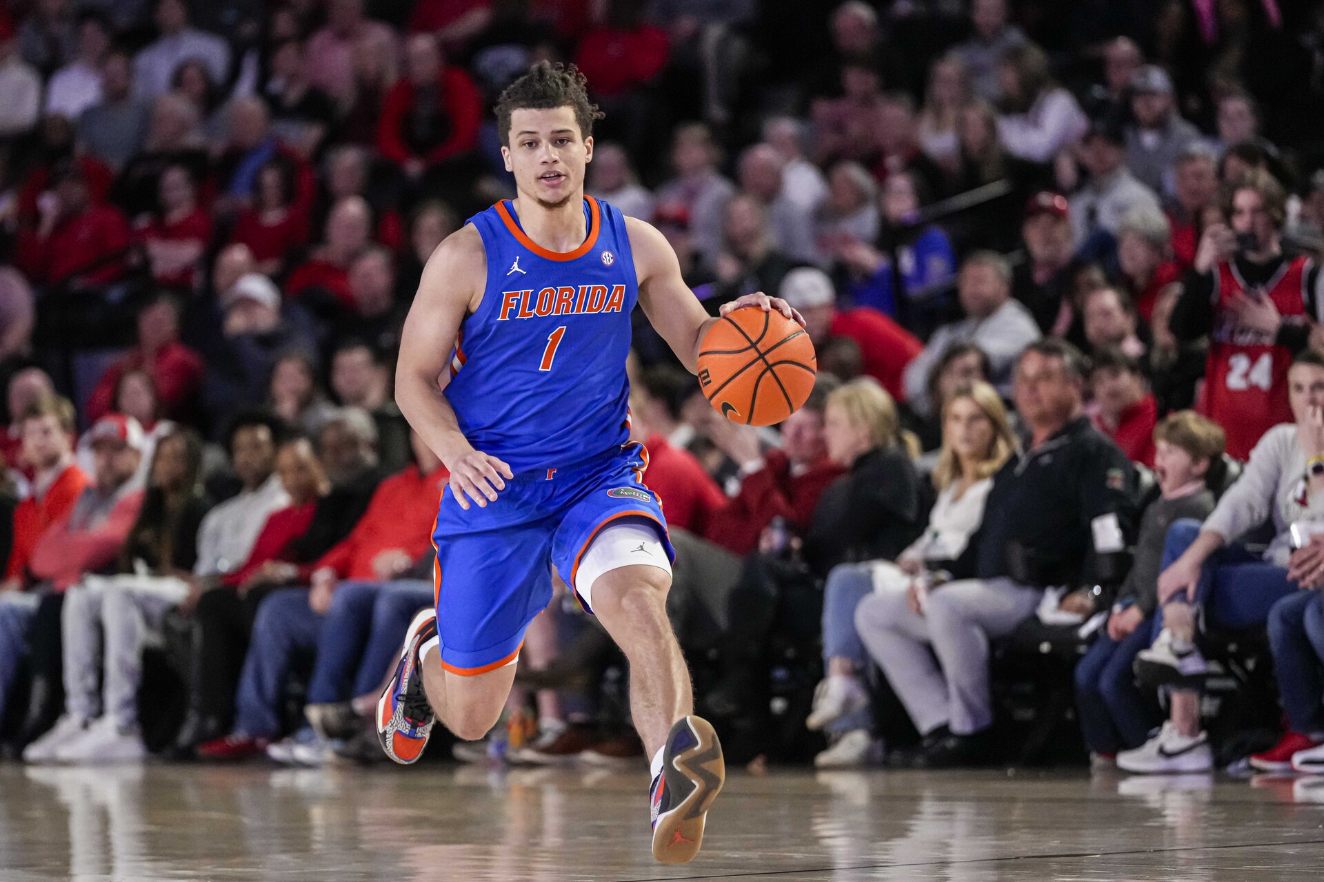 Feb 17, 2024; Athens, Georgia, USA; Florida Gators guard Walter Clayton Jr. (1) brings the ball up the court against the Georgia Bulldogs during the second half at Stegeman Coliseum.
