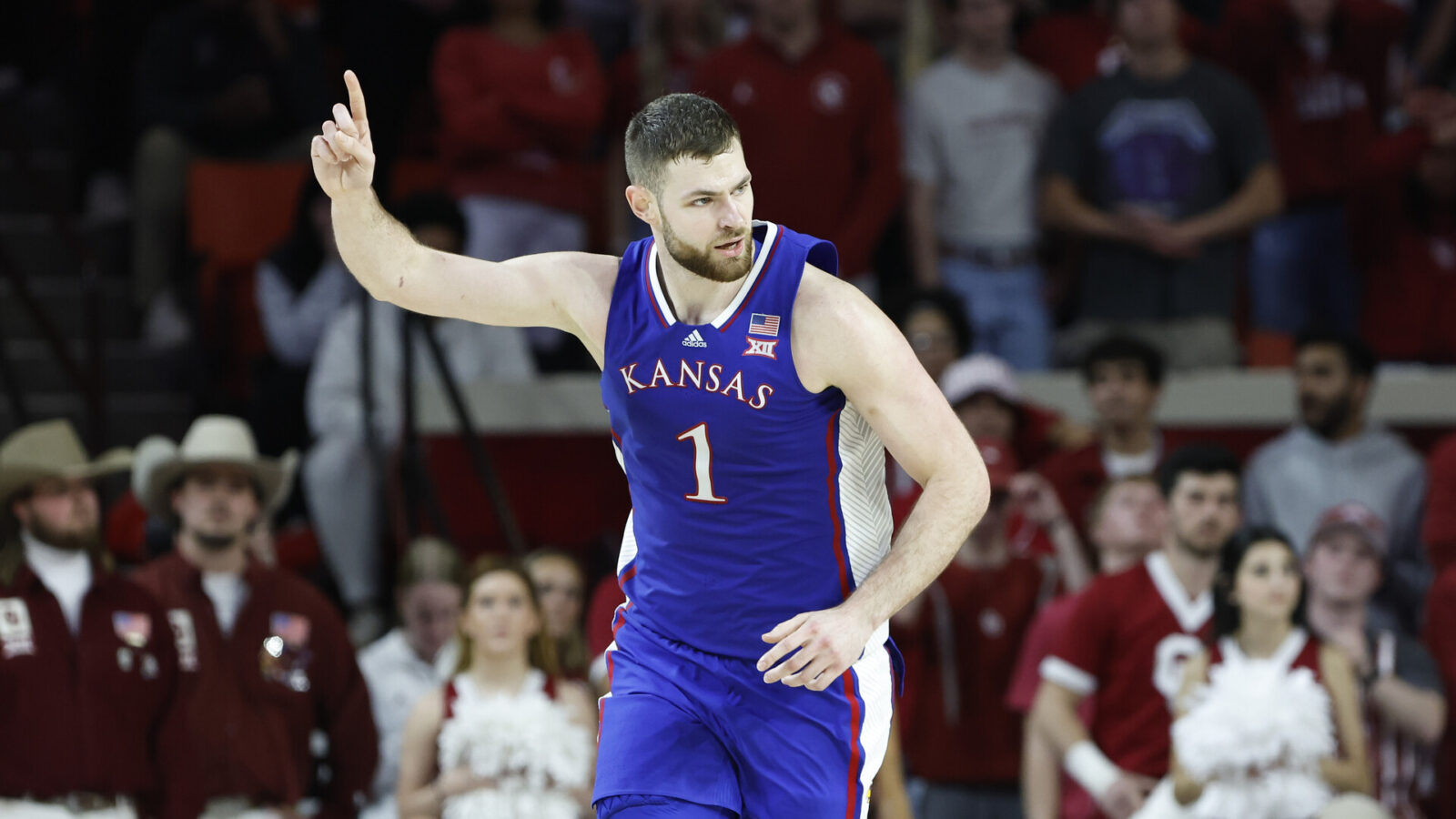 Feb 17, 2024; Norman, Oklahoma, USA; Kansas Jayhawks center Hunter Dickinson (1) gestures after scoring a basket against the Oklahoma Sooners during the second half at Lloyd Noble Center.