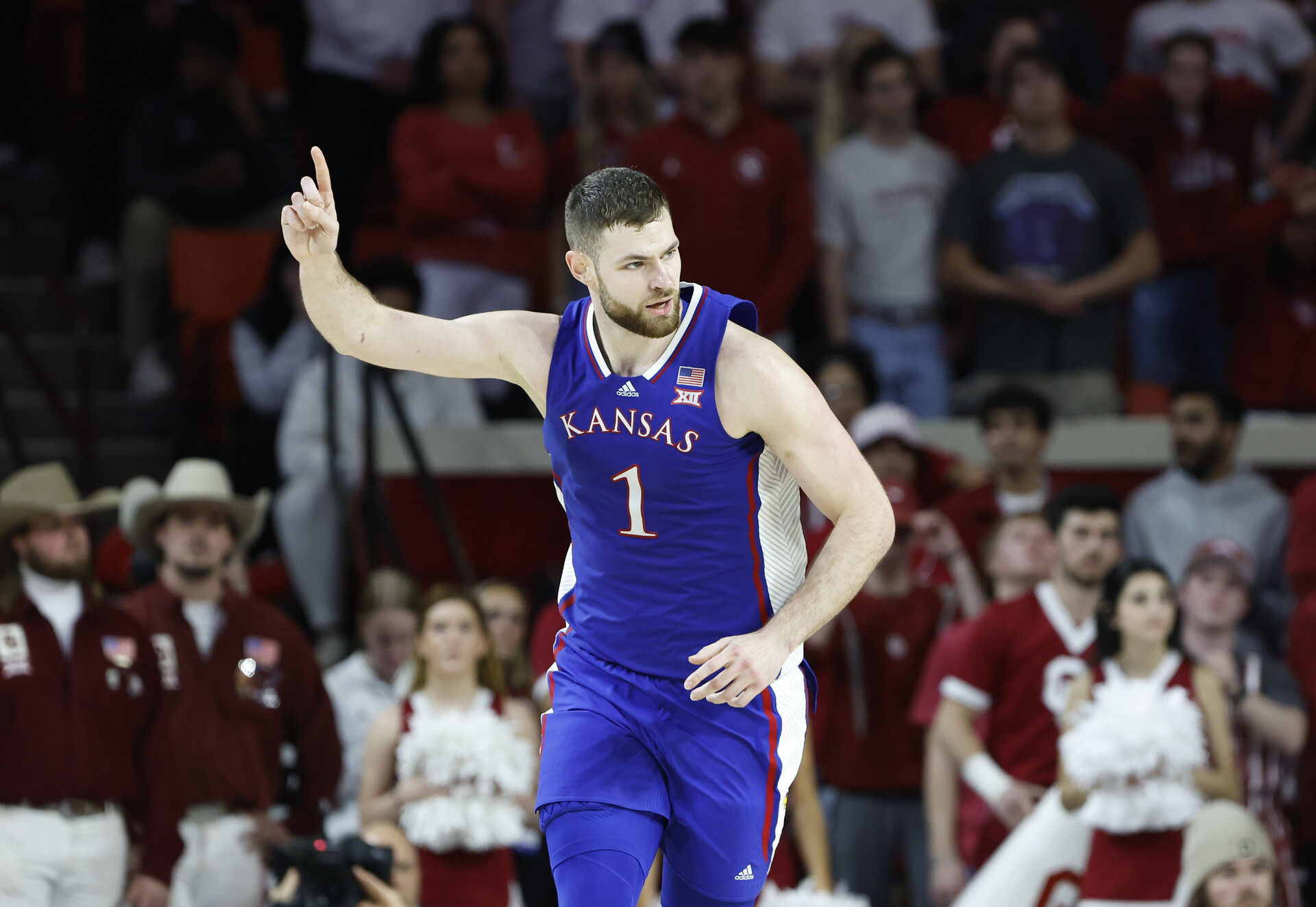 Feb 17, 2024; Norman, Oklahoma, USA; Kansas Jayhawks center Hunter Dickinson (1) gestures after scoring a basket against the Oklahoma Sooners during the second half at Lloyd Noble Center.
