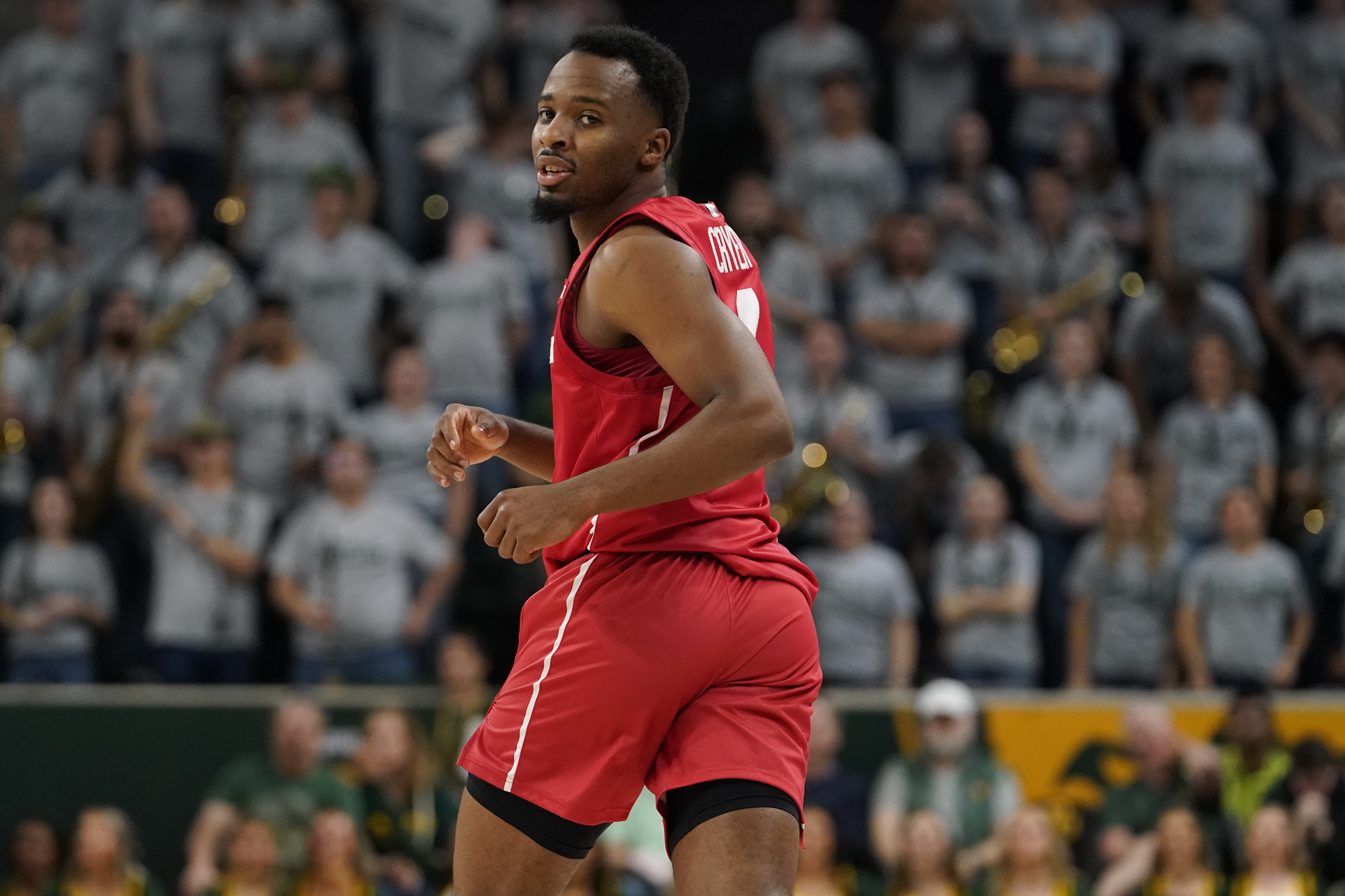 Feb 24, 2024; Waco, Texas, USA; Houston Cougars guard L.J. Cryer (4) reacts after a made three-point basket against against the Baylor Bears during the first half at Paul and Alejandra Foster Pavilion.