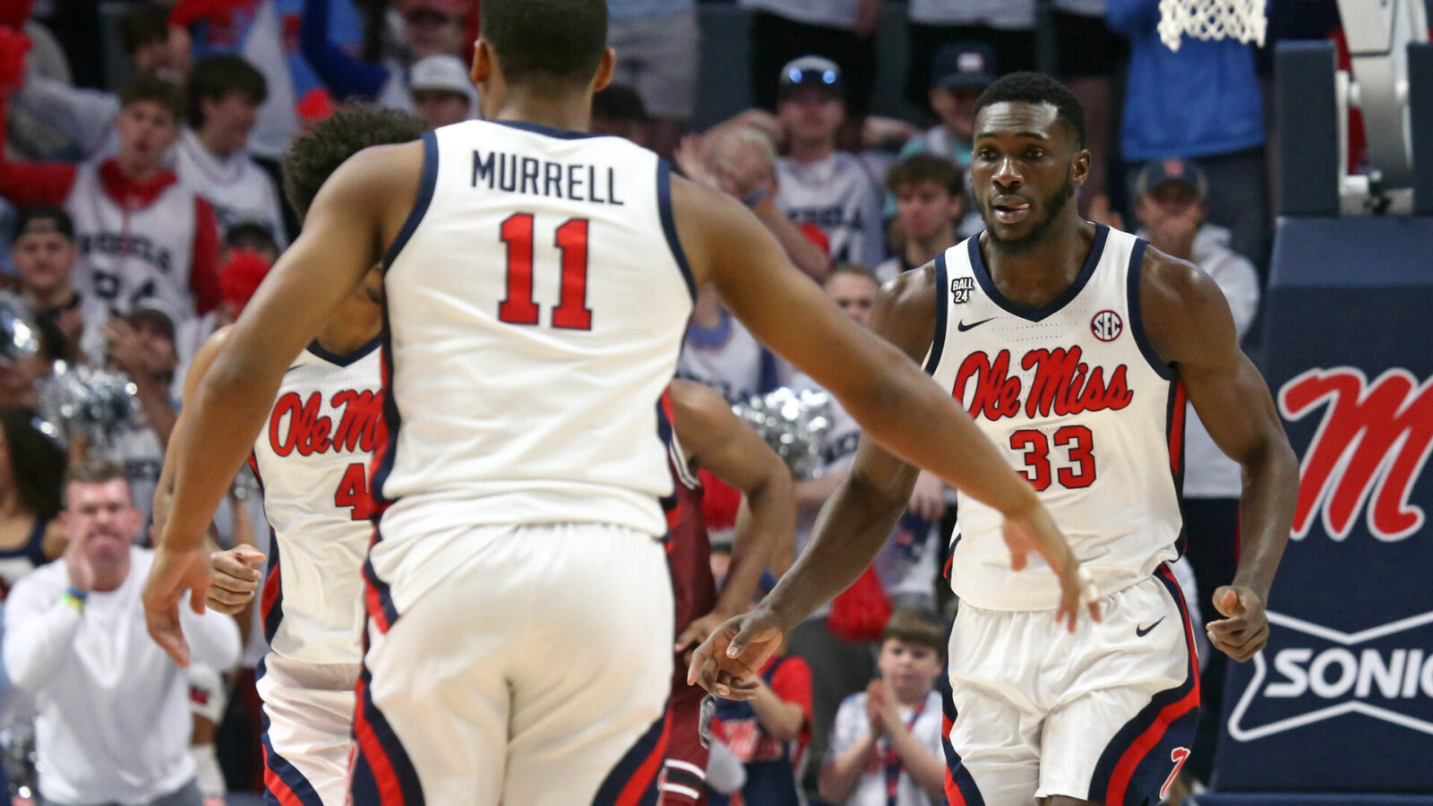 Feb 24, 2024; Oxford, Mississippi, USA; Mississippi Rebels forward Moussa Cisse (33) reacts with guard Matthew Murrell (11) after a dunk during the first half against the South Carolina Gamecocks at The Sandy and John Black Pavilion at Ole Miss.