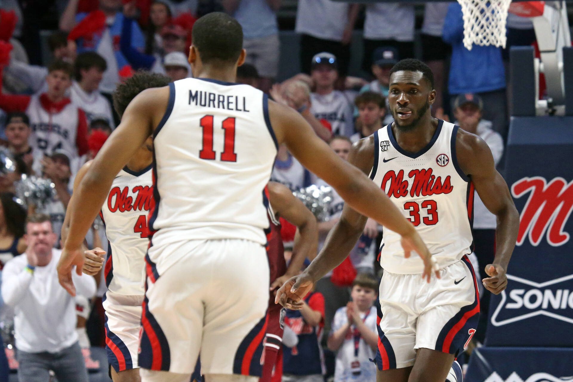 Feb 24, 2024; Oxford, Mississippi, USA; Mississippi Rebels forward Moussa Cisse (33) reacts with guard Matthew Murrell (11) after a dunk during the first half against the South Carolina Gamecocks at The Sandy and John Black Pavilion at Ole Miss.