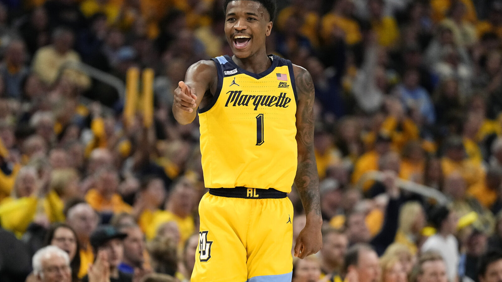 Feb 25, 2024; Milwaukee, Wisconsin, USA; Marquette Golden Eagles guard Kam Jones (1) reacts after scoring a a basket during the second half against the Xavier Musketeers at Fiserv Forum.
