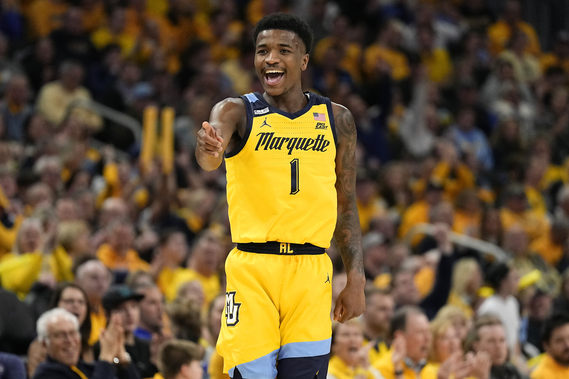 Feb 25, 2024; Milwaukee, Wisconsin, USA; Marquette Golden Eagles guard Kam Jones (1) reacts after scoring a a basket during the second half against the Xavier Musketeers at Fiserv Forum.