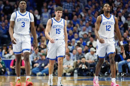 Feb 24, 2024; Lexington, Kentucky, USA; Kentucky Wildcats guards Adou Thiero (3), Reed Sheppard (15) and Antonio Reeves (12) return to the bench during the first half against the Alabama Crimson Tide at Rupp Arena at Central Bank Center.