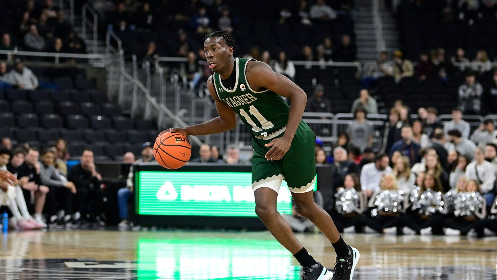 Nov 28, 2023; Providence, Rhode Island, USA; Wagner Seahawks guard Melvin Council Jr. (11) dribbles against the Providence Friars during the second half at Amica Mutual Pavilion.