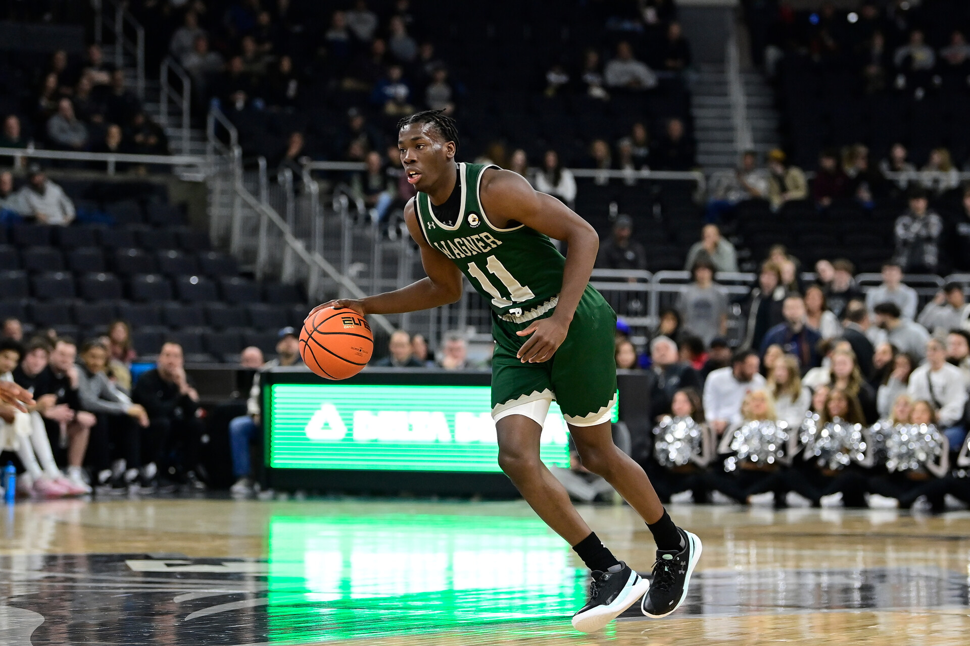 Nov 28, 2023; Providence, Rhode Island, USA; Wagner Seahawks guard Melvin Council Jr. (11) dribbles against the Providence Friars during the second half at Amica Mutual Pavilion.
