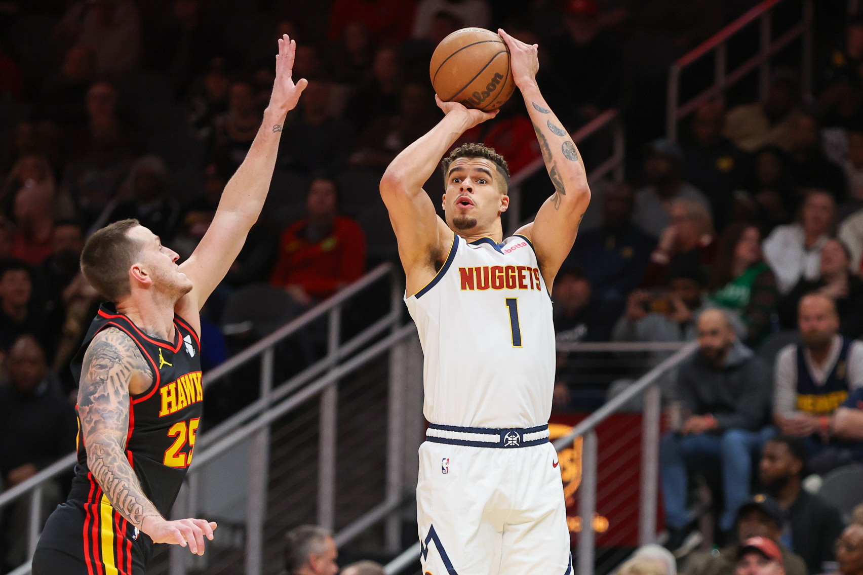 Denver Nuggets forward Michael Porter Jr. (1) shoots against the Atlanta Hawks in the first quarter at State Farm Arena.