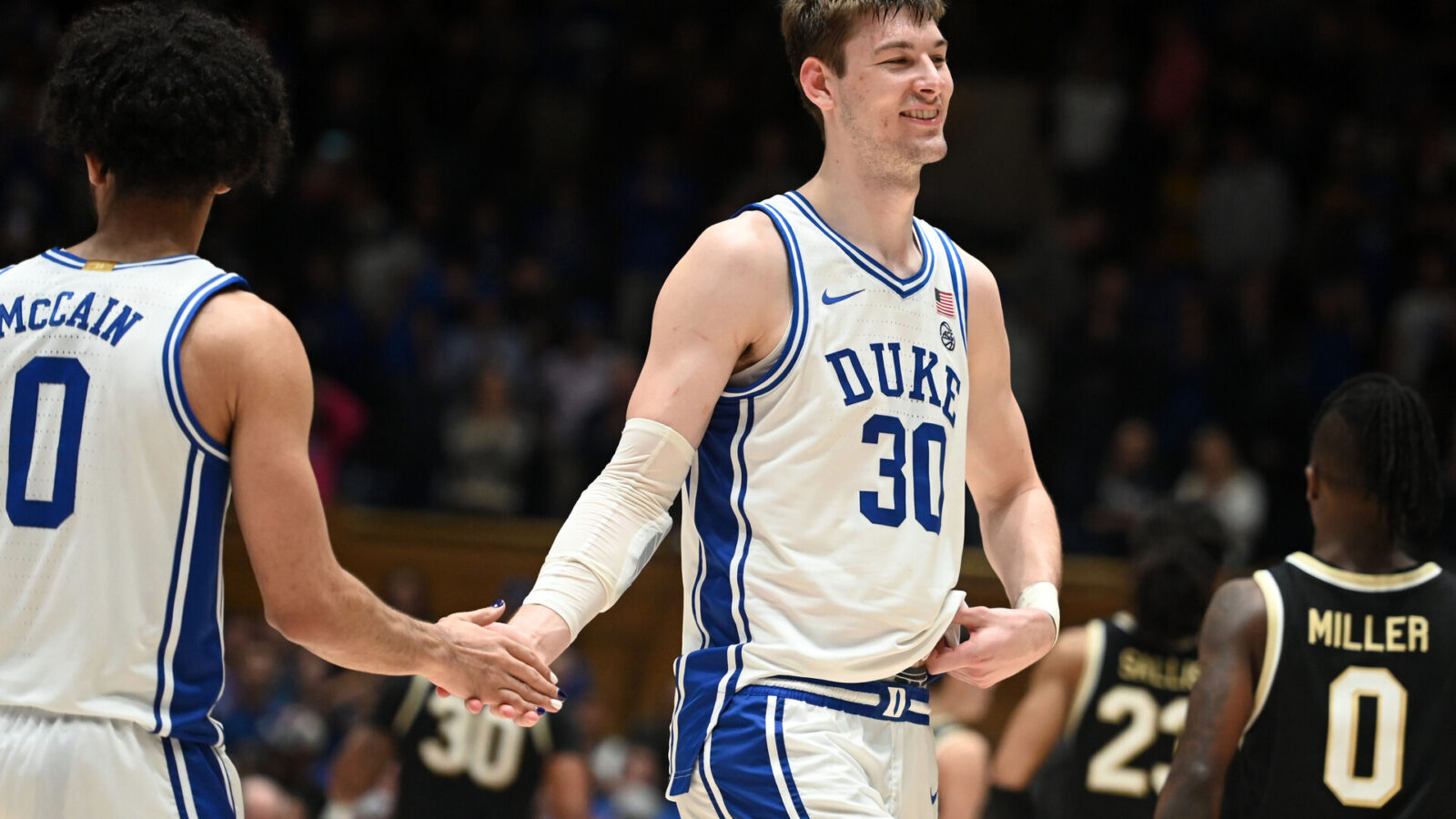 Feb 12, 2024; Durham, North Carolina, USA; Duke Blue Devils center Kyle Filipowski (30) reacts after beating the Wake Forest Deamon Deacons at Cameron Indoor Stadium. The Blue Devils won 77-69.
