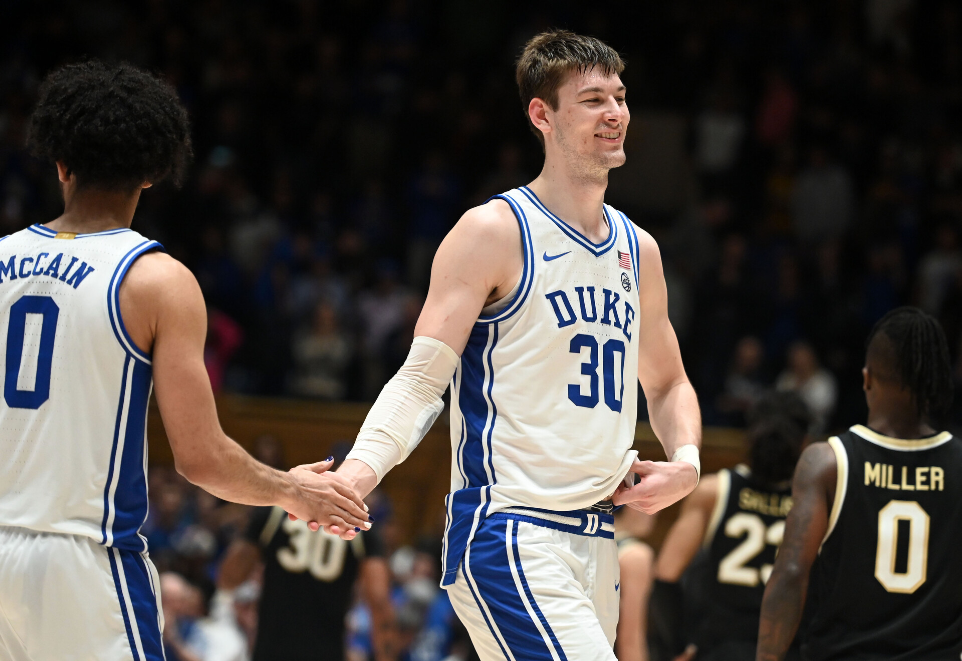 Feb 12, 2024; Durham, North Carolina, USA; Duke Blue Devils center Kyle Filipowski (30) reacts after beating the Wake Forest Deamon Deacons at Cameron Indoor Stadium. The Blue Devils won 77-69.