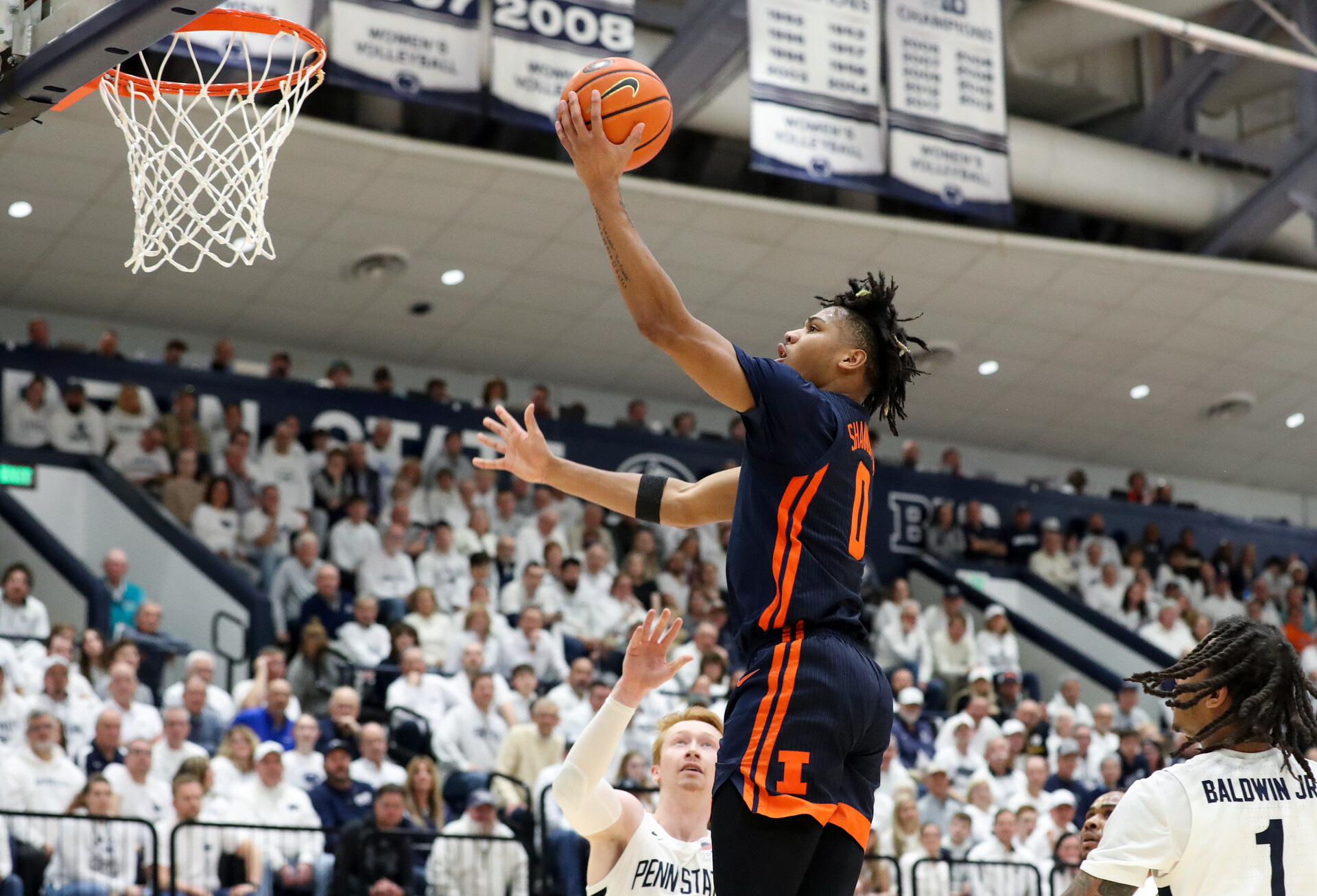 Feb 21, 2024; University Park, Pennsylvania, USA; Illinois Fighting Illini guard Terrence Shannon Jr (0) drives during the first half against the Penn State Nittany Lions at Rec Hall.