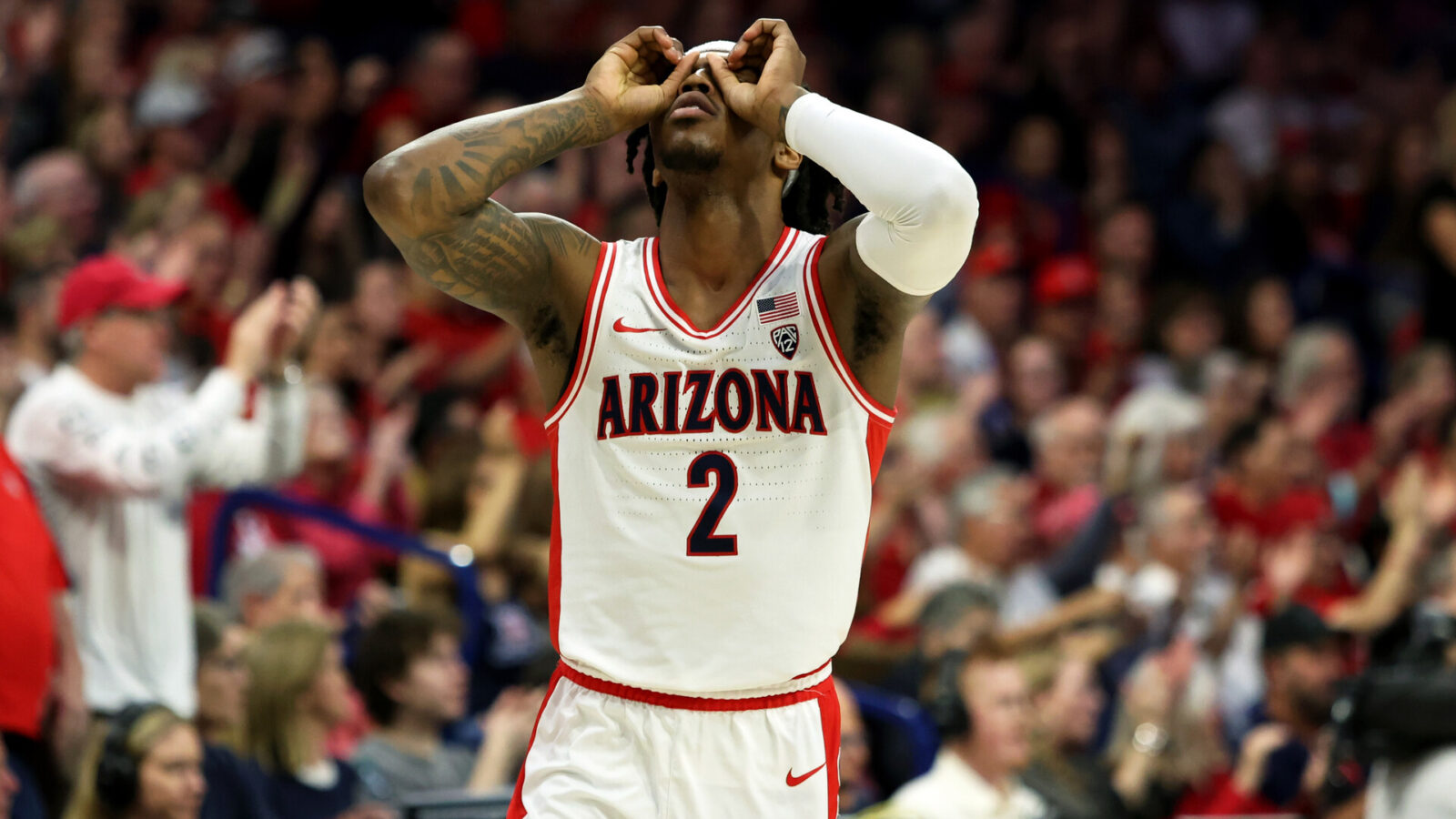 Feb 24, 2024; Tucson, Arizona, USA; Arizona Wildcats guard Caleb Love (2) celebrates after an assist against the Washington Huskies during the first half at McKale Center.