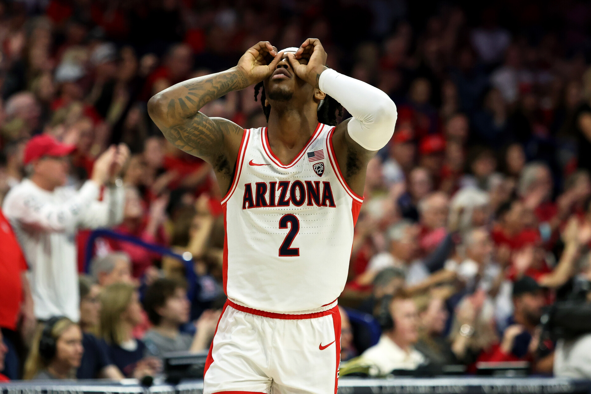 Feb 24, 2024; Tucson, Arizona, USA; Arizona Wildcats guard Caleb Love (2) celebrates after an assist against the Washington Huskies during the first half at McKale Center.