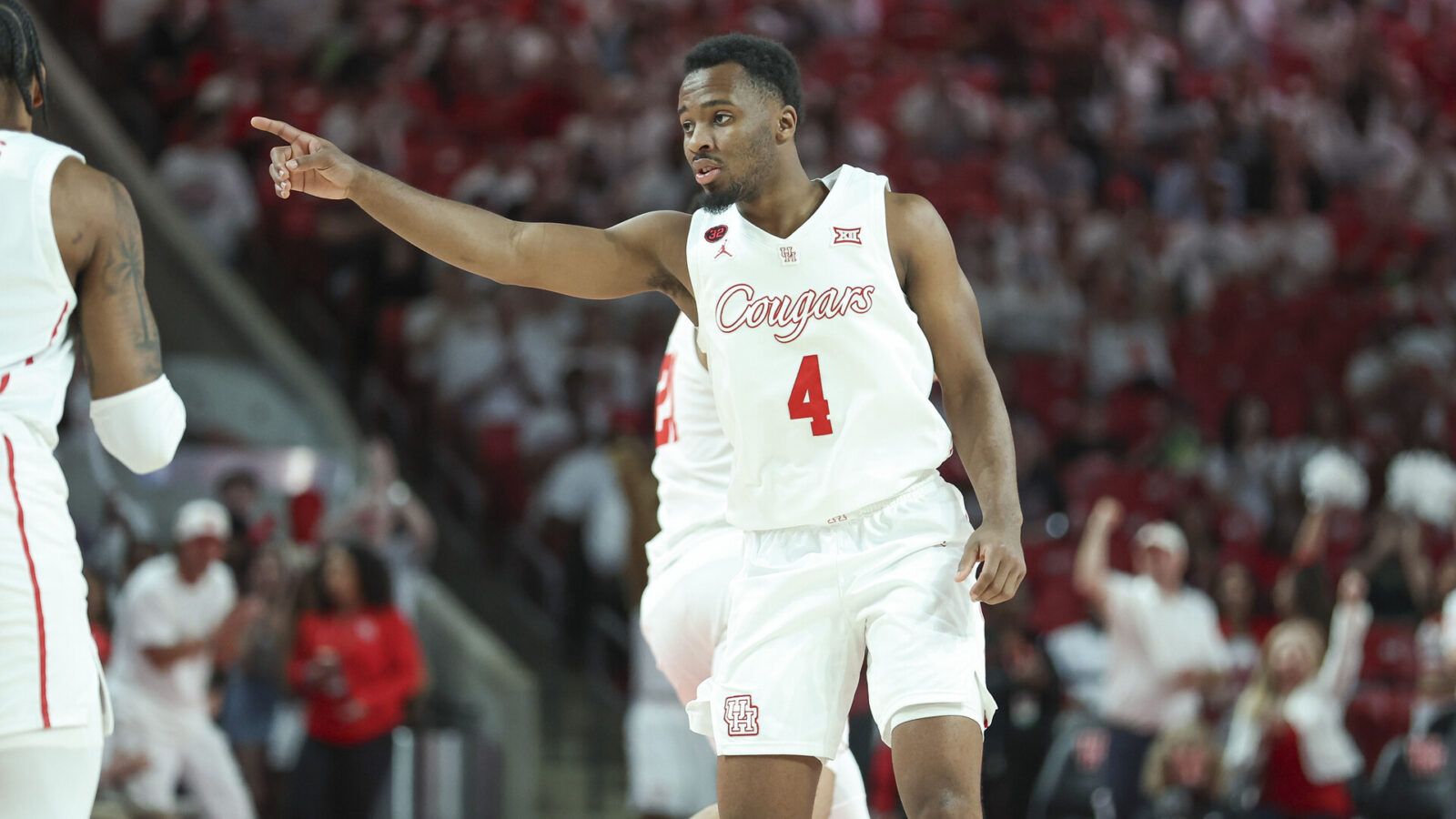 Feb 27, 2024; Houston, Texas, USA; Houston Cougars guard L.J. Cryer (4) reacts after making a basket during the first half against the Cincinnati Bearcats at Fertitta Center.