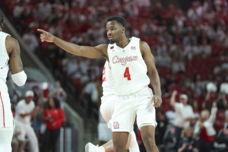 Feb 27, 2024; Houston, Texas, USA; Houston Cougars guard L.J. Cryer (4) reacts after making a basket during the first half against the Cincinnati Bearcats at Fertitta Center.