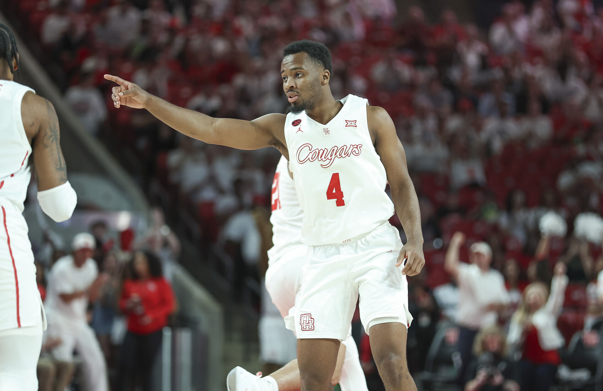 Feb 27, 2024; Houston, Texas, USA; Houston Cougars guard L.J. Cryer (4) reacts after making a basket during the first half against the Cincinnati Bearcats at Fertitta Center.