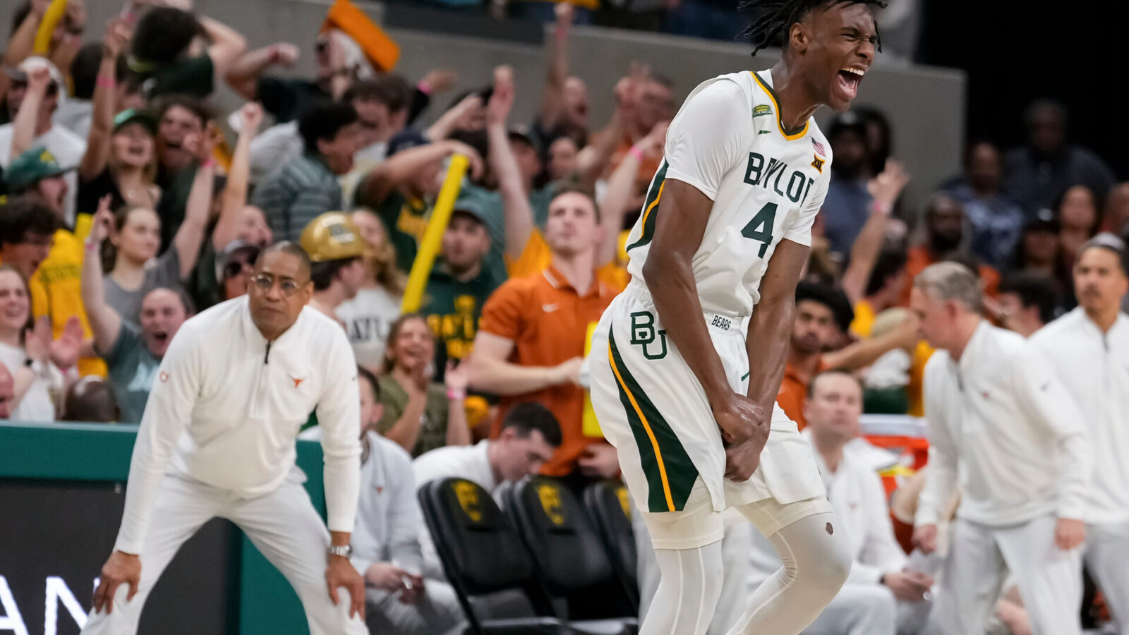 Mar 4, 2024; Waco, Texas, USA; Baylor Bears guard Ja'Kobe Walter (4) reacts after scoring a three point basket against the Texas Longhorns during the second half at Paul and Alejandra Foster Pavilion.