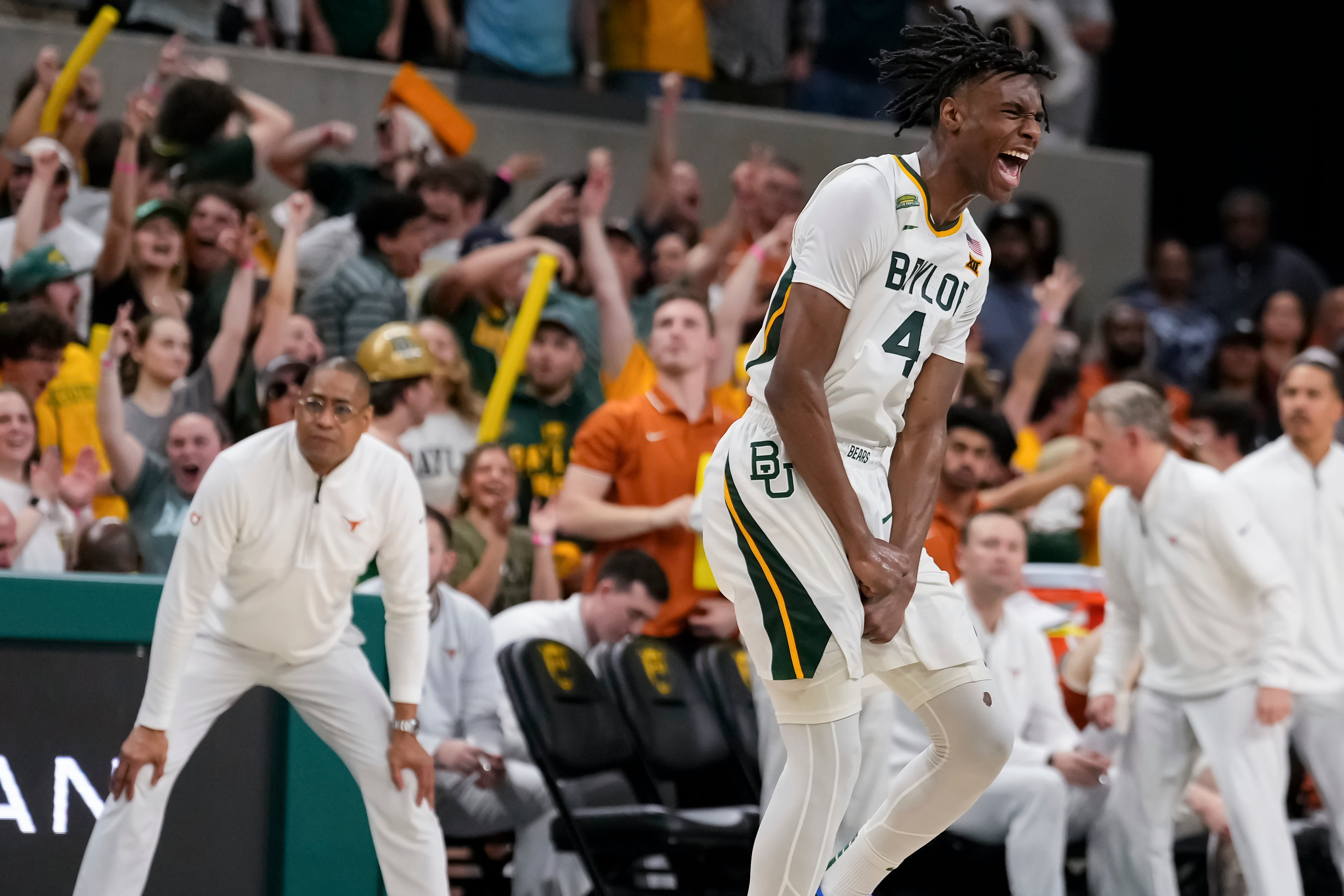 Mar 4, 2024; Waco, Texas, USA; Baylor Bears guard Ja'Kobe Walter (4) reacts after scoring a three point basket against the Texas Longhorns during the second half at Paul and Alejandra Foster Pavilion.