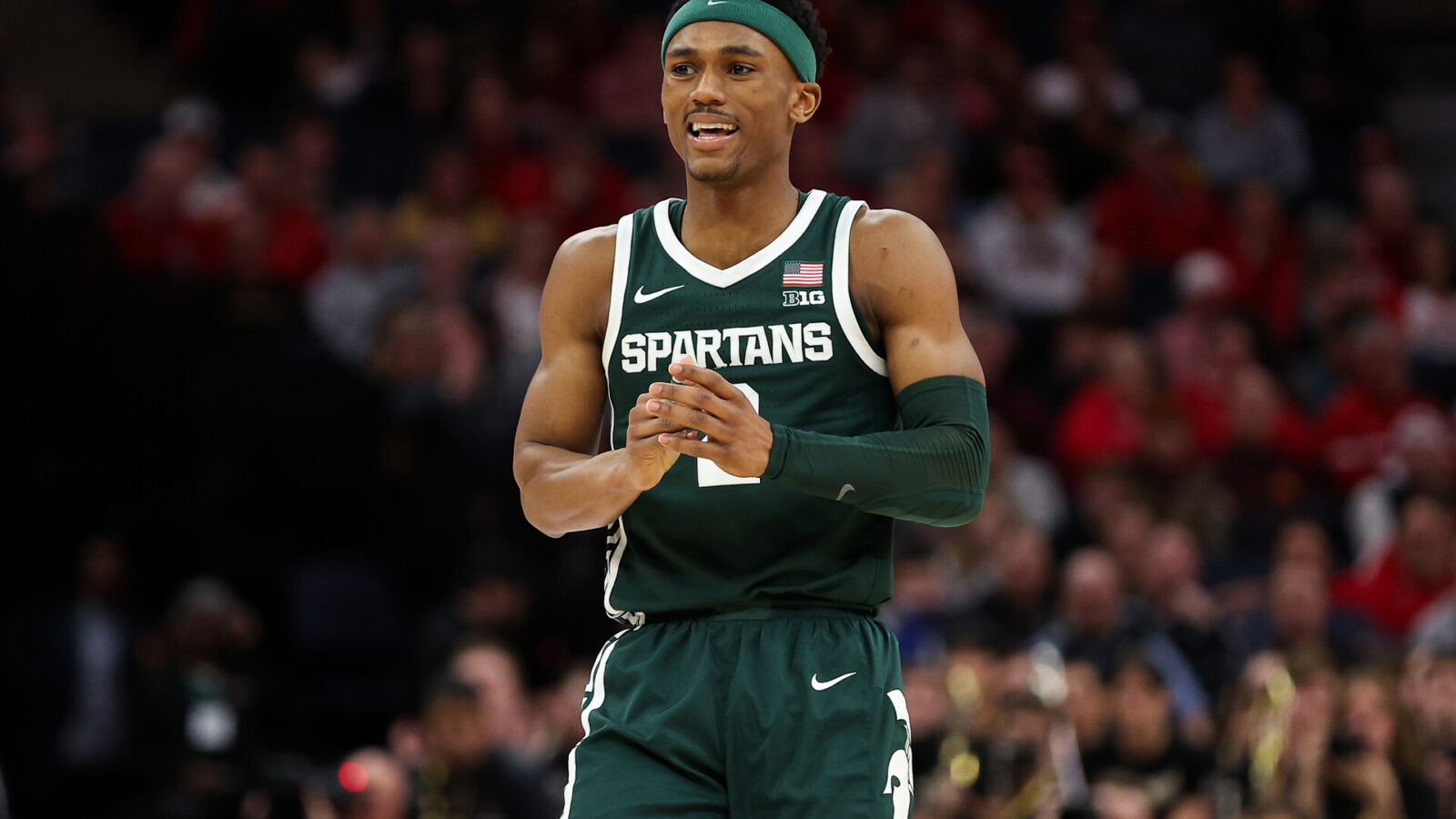 Mar 15, 2024; Minneapolis, MN, USA; Michigan State Spartans guard Tyson Walker (2) reacts to a missed basket against the Purdue Boilermakers during the second half at Target Center.
