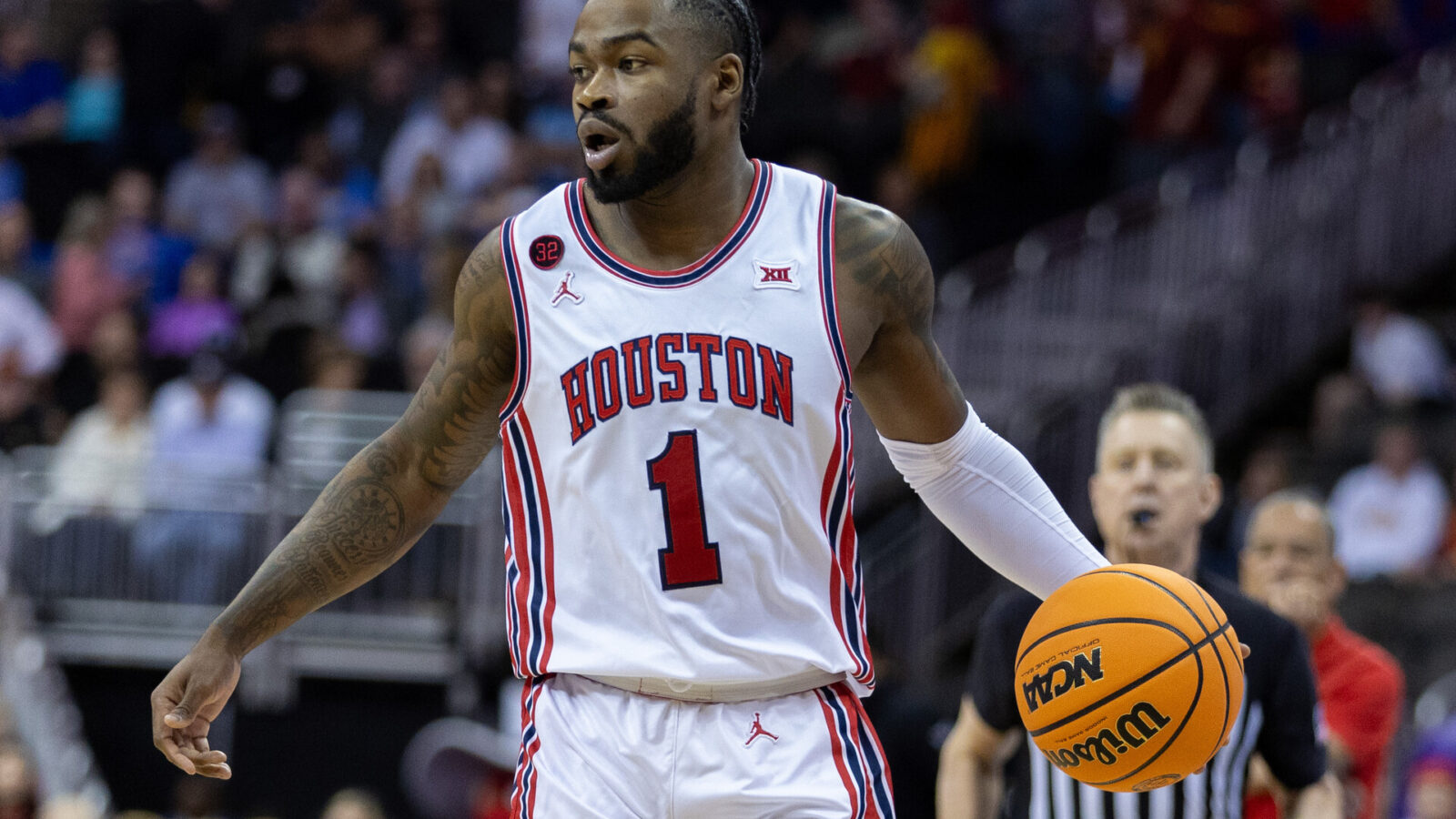 Mar 15, 2024; Kansas City, MO, USA; Houston Cougars guard Jamal Shead (1) brings the ball up court during the first half against the Texas Tech Red Raiders at T-Mobile Center.