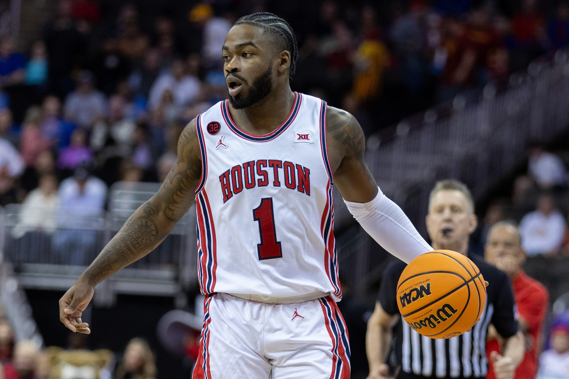 Mar 15, 2024; Kansas City, MO, USA; Houston Cougars guard Jamal Shead (1) brings the ball up court during the first half against the Texas Tech Red Raiders at T-Mobile Center.