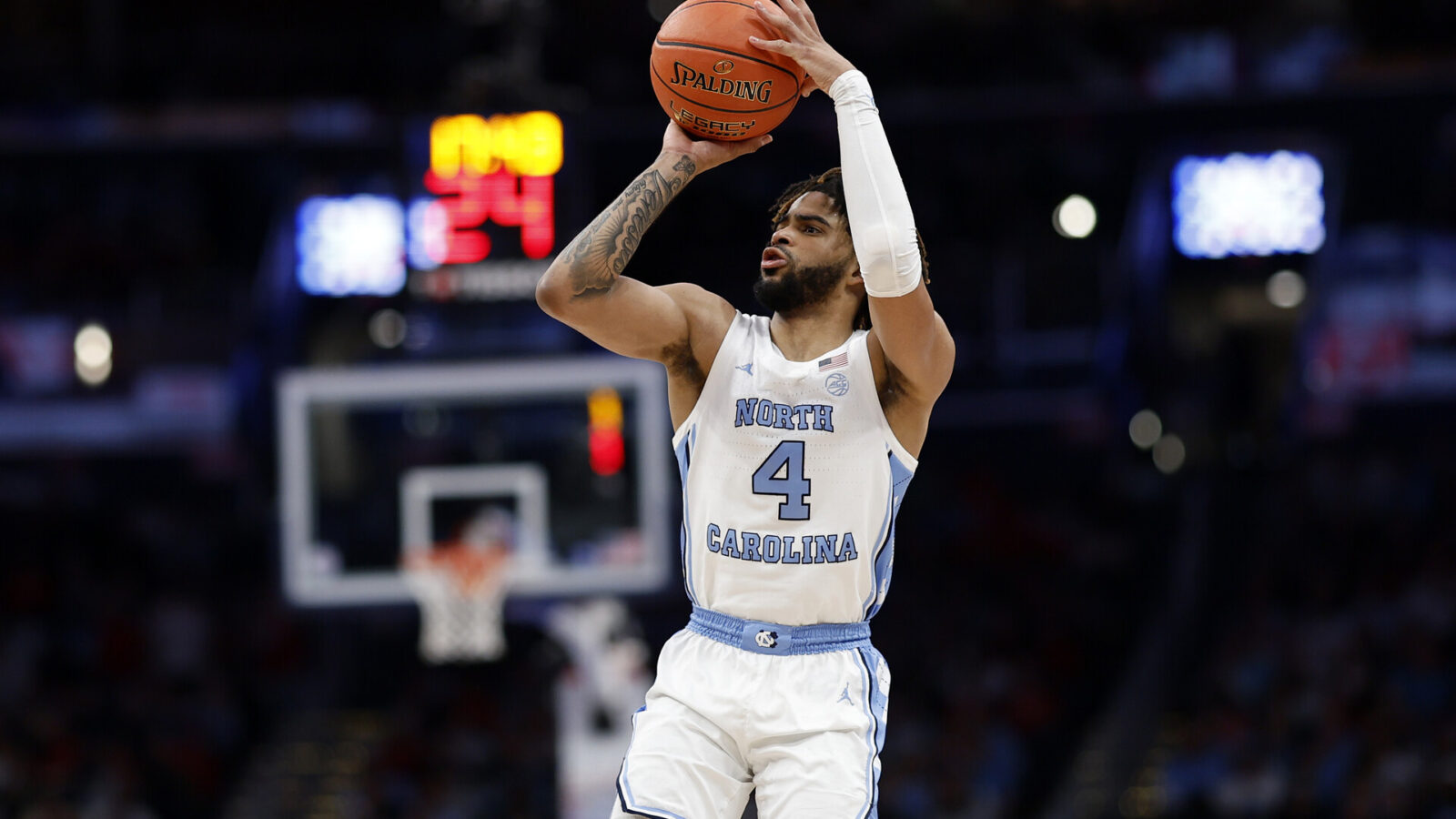 Mar 16, 2024; Washington, D.C., USA; North Carolina Tar Heels guard RJ Davis (4) shoots the ball against the North Carolina State Wolfpack during the second half at Capital One Arena.