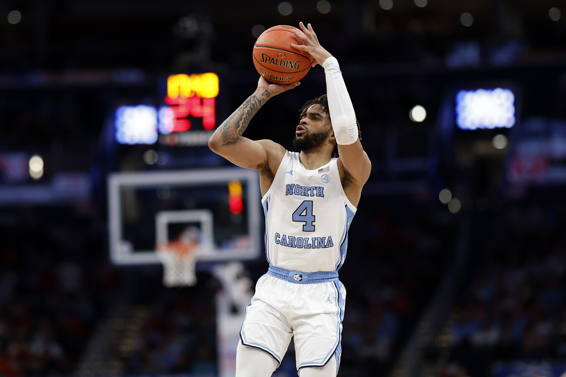 Mar 16, 2024; Washington, D.C., USA; North Carolina Tar Heels guard RJ Davis (4) shoots the ball against the North Carolina State Wolfpack during the second half at Capital One Arena.