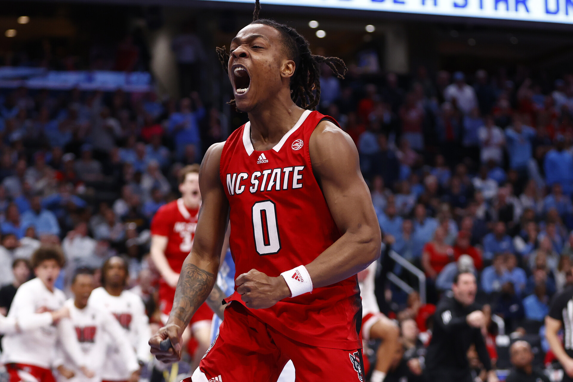 Mar 16, 2024; Washington, D.C., USA; North Carolina State Wolfpack guard DJ Horne (0) reacts against the North Carolina Tar Heels during the second half at Capital One Arena.