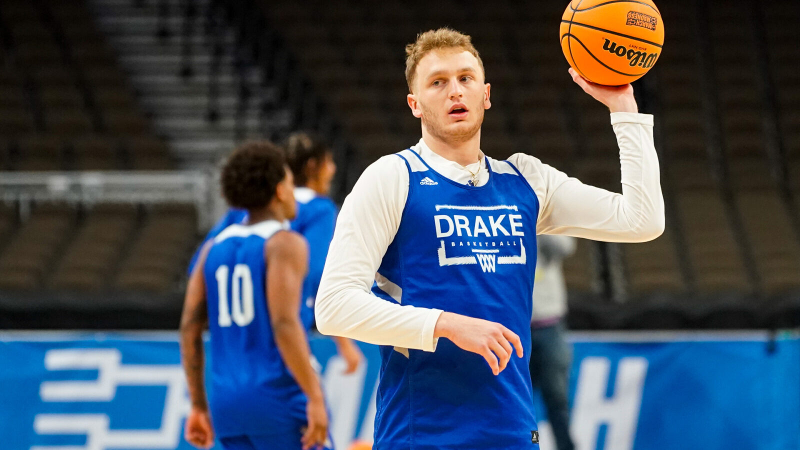 Mar 20, 2024; Omaha, NE, USA; Drake Bulldogs guard Tucker DeVries (12) warms up during the NCAA first round practice session at CHI Health Center Omaha.