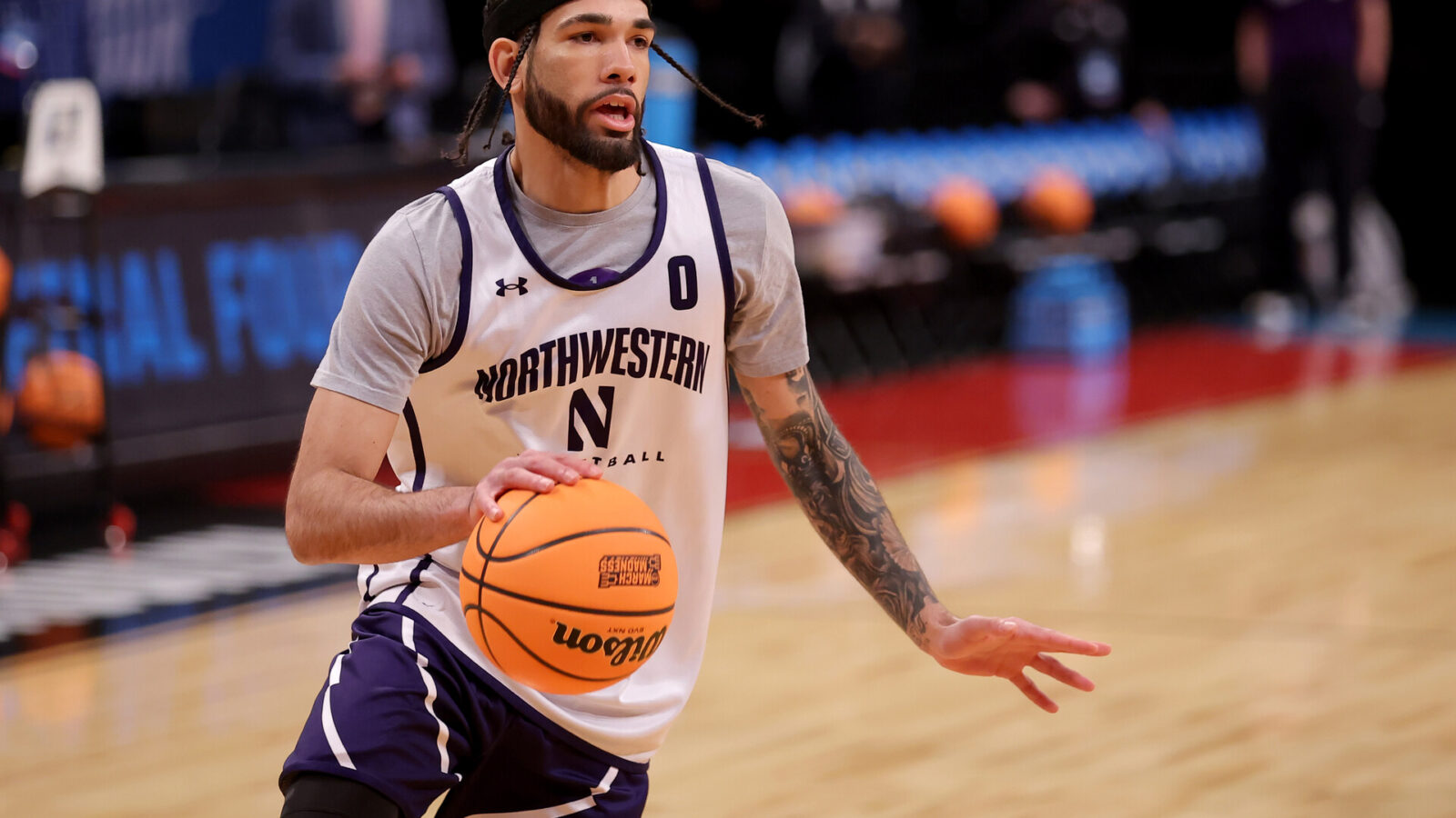 Mar 21, 2024; Brooklyn, NY, USA; Northwestern Wildcats guard Boo Buie (0) drives to the basket during team practice at Barclays Center.