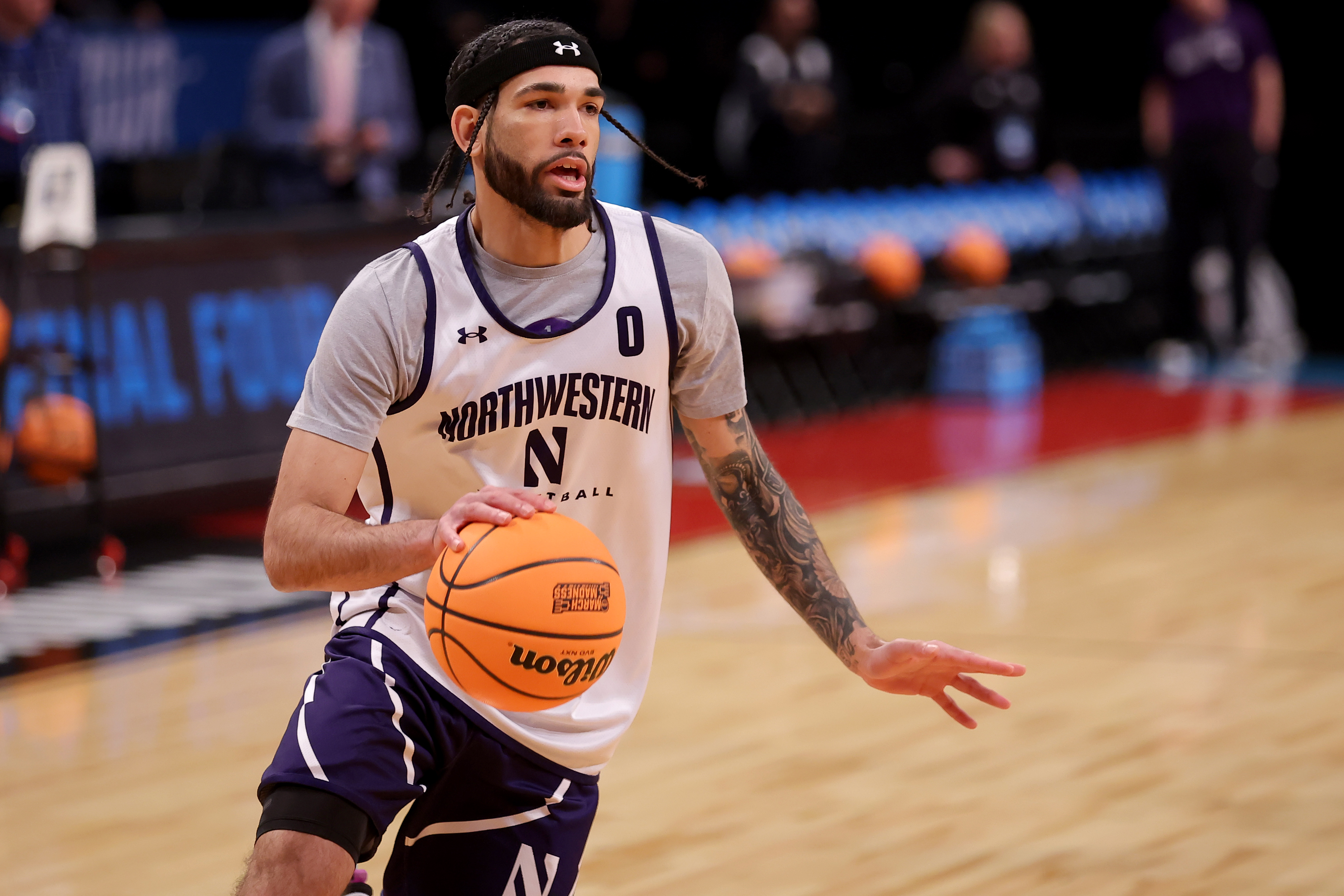Mar 21, 2024; Brooklyn, NY, USA; Northwestern Wildcats guard Boo Buie (0) drives to the basket during team practice at Barclays Center.