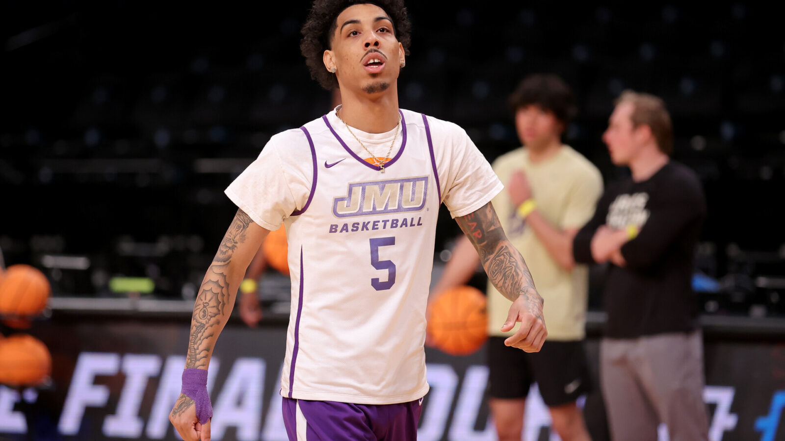 Mar 21, 2024; Brooklyn, NY, USA; James Madison Dukes guard Terrence Edwards Jr. (5) reacts during team practice at Barclays Center.