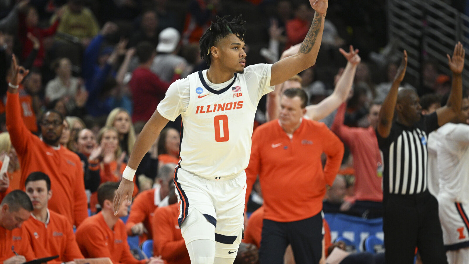 Mar 23, 2024; Omaha, NE, USA; Illinois Fighting Illini guard Terrence Shannon Jr. (0) reacts during the second half against the Duquesne Dukes in the second round of the 2024 NCAA Tournament at CHI Health Center Omaha.