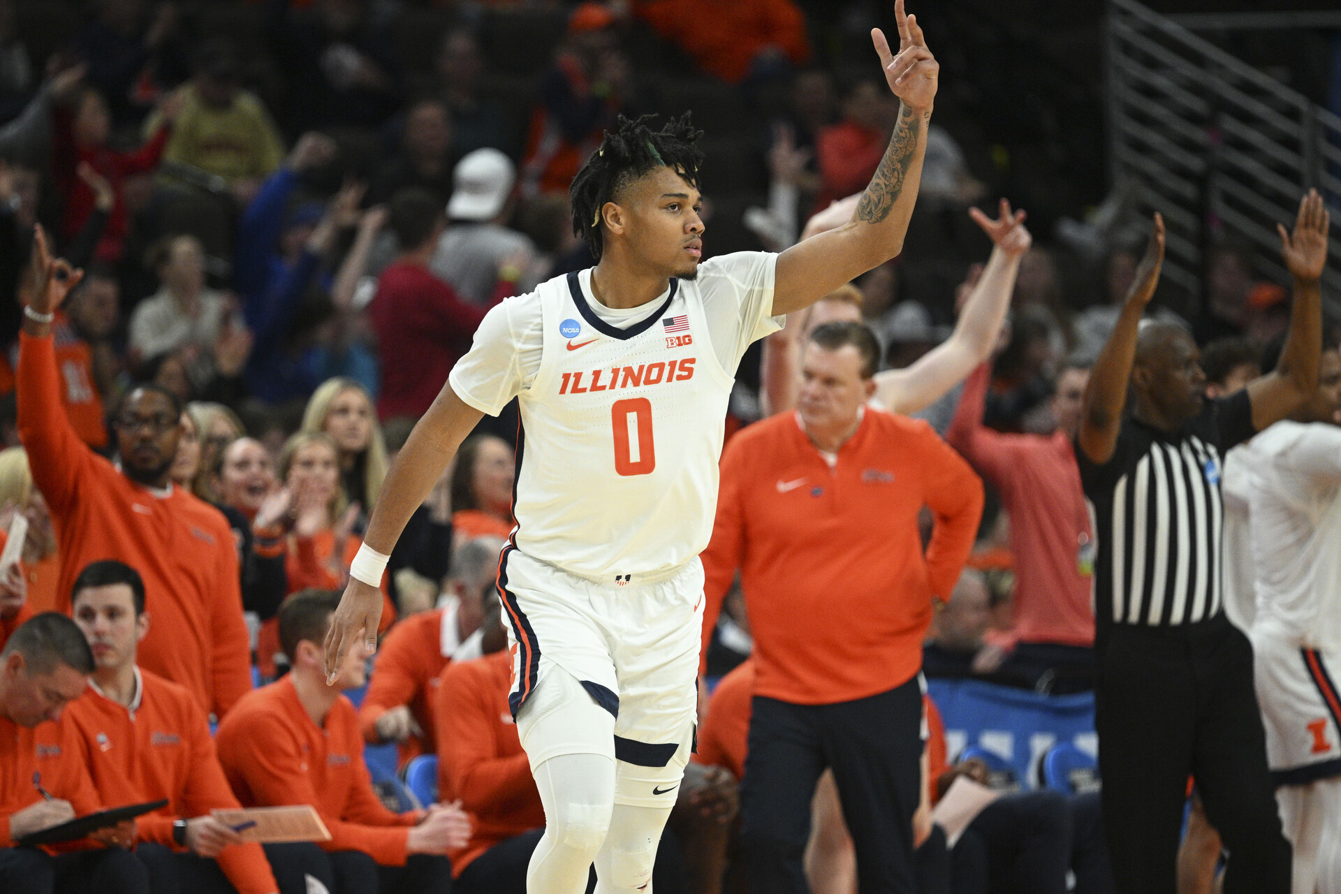 Mar 23, 2024; Omaha, NE, USA; Illinois Fighting Illini guard Terrence Shannon Jr. (0) reacts during the second half against the Duquesne Dukes in the second round of the 2024 NCAA Tournament at CHI Health Center Omaha.