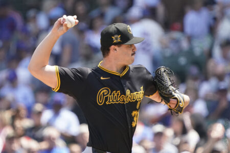 Pittsburgh Pirates pitcher Paul Skenes (30) throws the ball against the Chicago Cubs during the first inning at Wrigley Field.